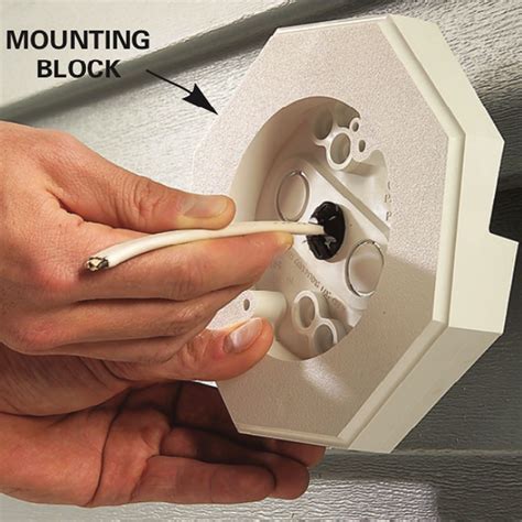 mount electrical box to vinyl siding|vinyl siding doorbell mounting block.